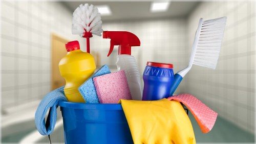 Kitchen surfaces being cleaned before move in at a Hammersmith property