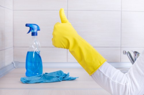 Local carpet cleaner treating hallway carpet stains in Hammersmith